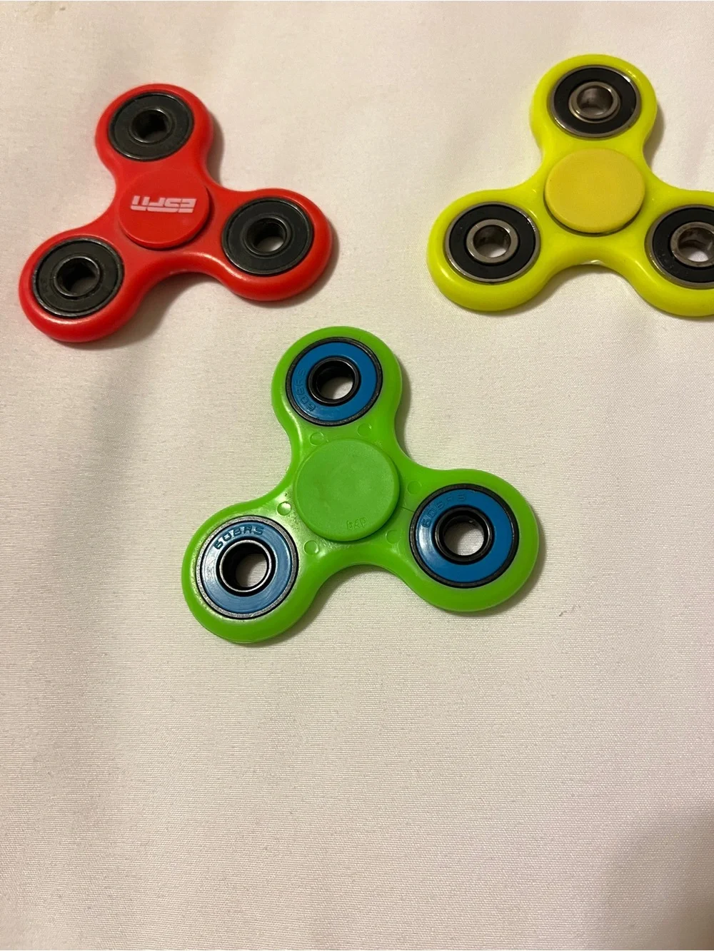 Lot of 3 Fidget Spinners ESPN Dish Network Plastic Toy Red Green Yellow